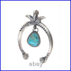 Mary Cayatineto Navajo sterling silver Naja pendant with turquoise