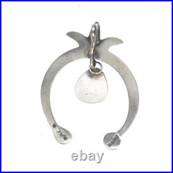 Mary Cayatineto Navajo sterling silver Naja pendant with turquoise