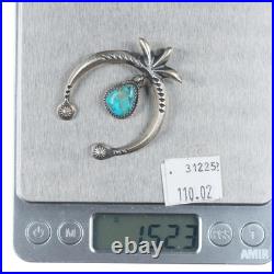 Mary Cayatineto Navajo sterling silver Naja pendant with turquoise
