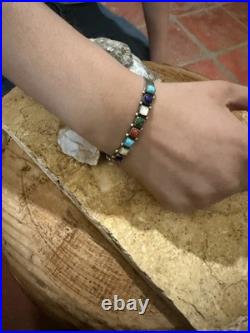 Navajo Multi Gemstone/Sterling Silver cuff and earrings. Sawtooth bezel. Vintage