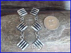 Navajo Sterling Silver Ribbed Post Earrings by Tahe