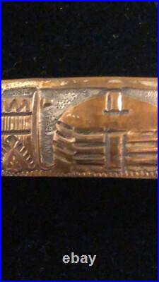 Navajo Storyteller Cuff. Gold Silver Turquoise Coral Inlay. Signed
