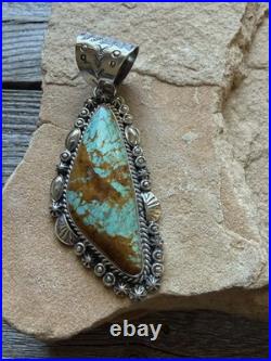 Navajo sterling silver number 8 turquoise pendant KY