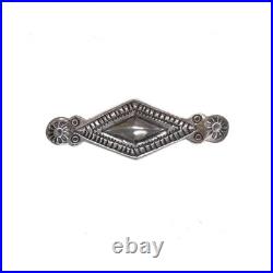 Vintage Navajo sterling silver chiseled repousse pin