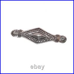 Vintage Navajo sterling silver chiseled repousse pin