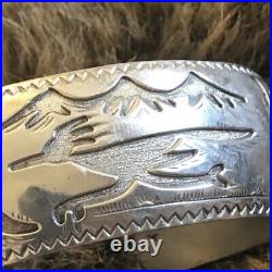 Vintage TA Begay storyteller Navajo sterling silver cuff bracelet